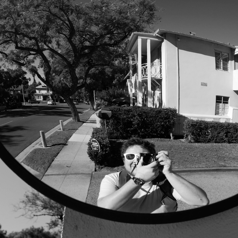 author’s self-portrait in an intersection mirror