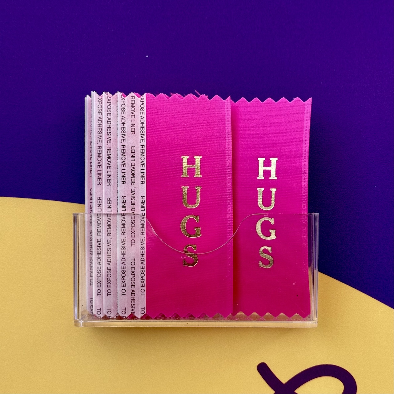 pink “hugs” ribbon pink “hugs” ribbon