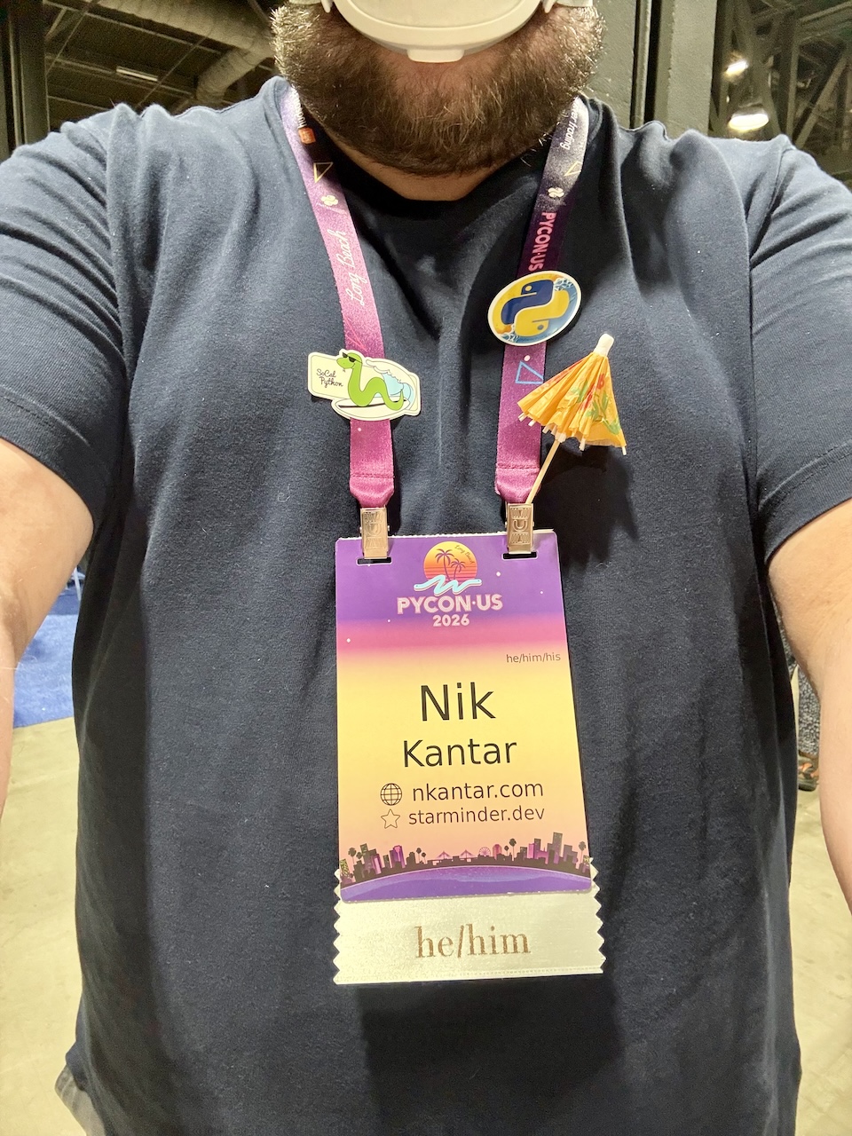conference badge with “Nik Kantar”, “nkantar.com”, “starminder.dev”, and “he/him” conference badge with “Nik Kantar”, “nkantar.com”, “starminder.dev”, and “he/him”